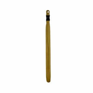 A 24" long rattan bdsm paddle facing down